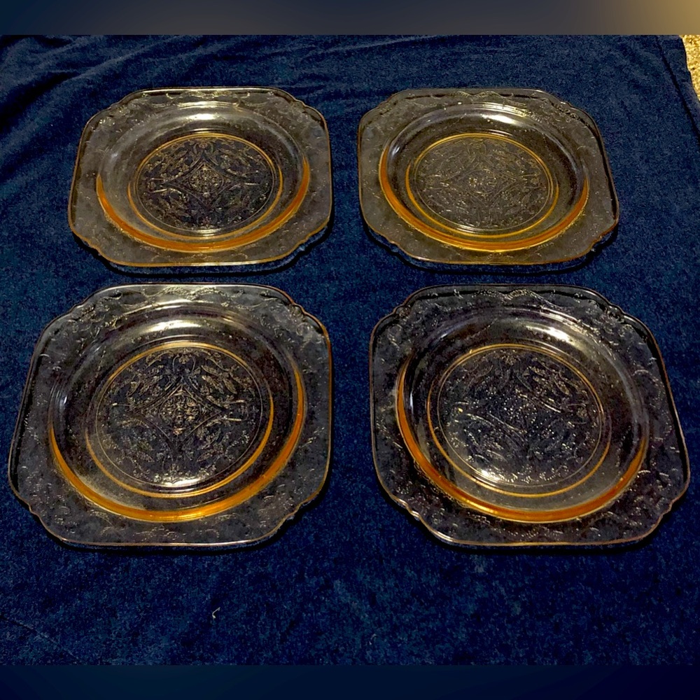 Vintage set of four pink depression plates